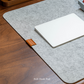 Featuring a light grey premium felt fabric finish, this is a desk mat that brings visual structure, comfort and organization to your setup